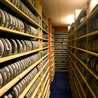 An archive with shelves full of records.