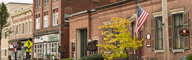 An American flag hang from a pole on a main street in Honesdale, Pennsylvania.