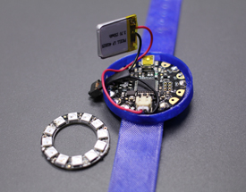 This digital tracker watch was created for City Streets participants by Stephen Pettus, a Temple University student who participates in the Creative Tech Works Design Studio (CTW) program in Philadelphia.