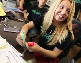 Young people attend MyPath financial literacy class to learn how to open bank accounts, create savings plans, and establish credit.