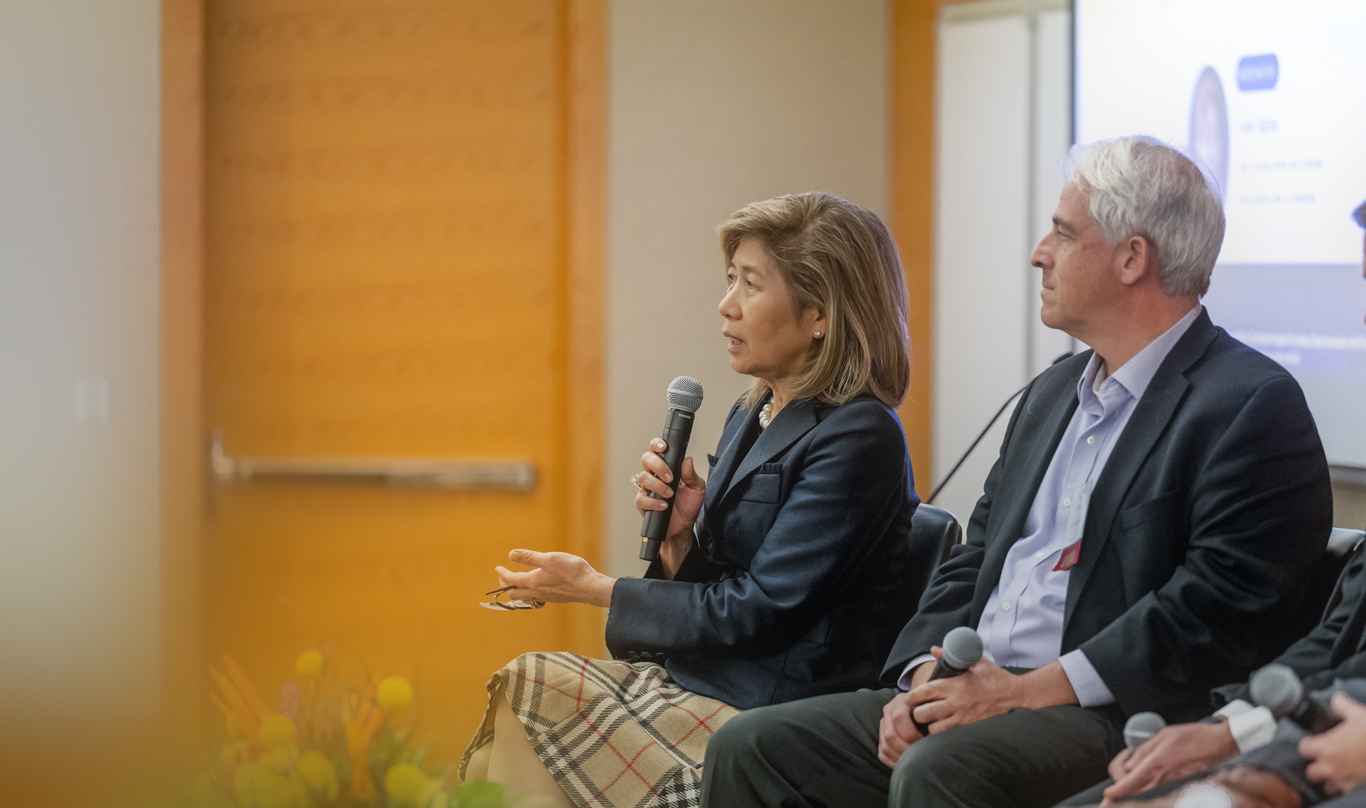 Julapa Jagtiani moderates a panel discussion at the Ninth Annual Fintech Conference.