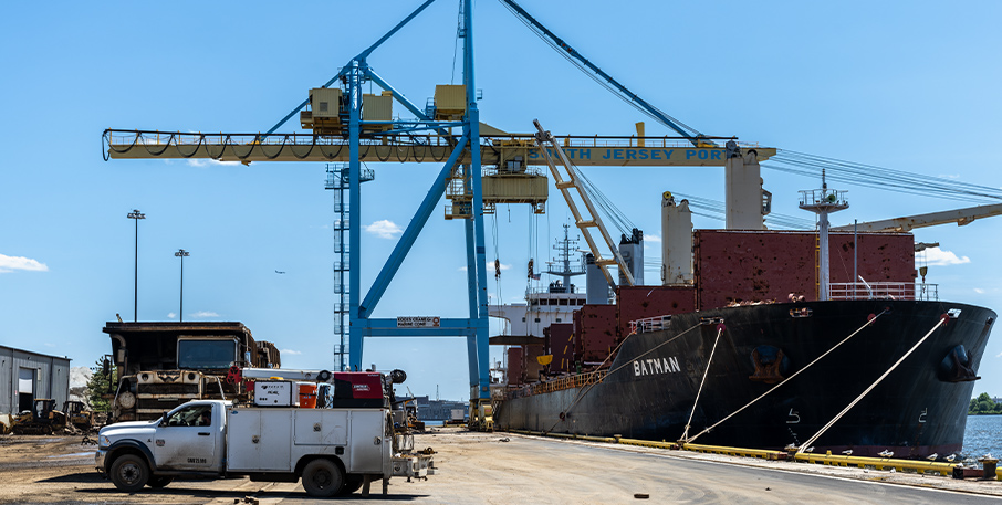 A large ship is docked at a port in Camden, New Jersey.