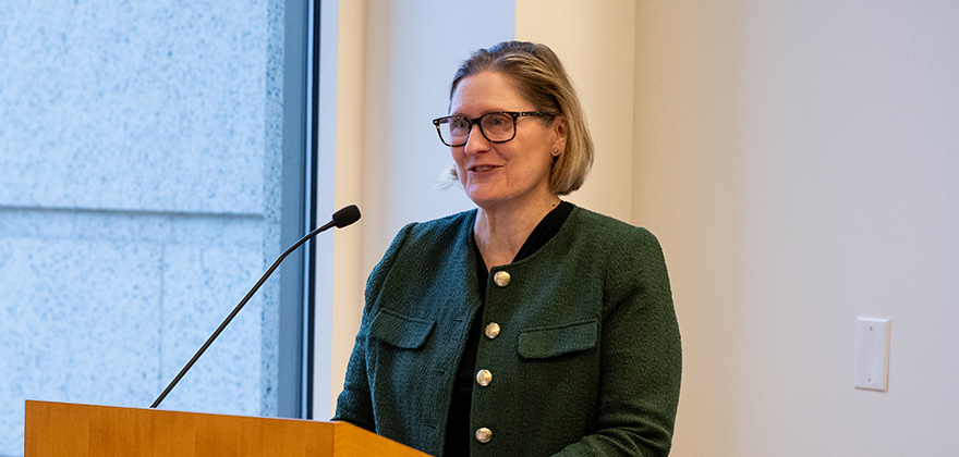 Anna Paulson at the podium