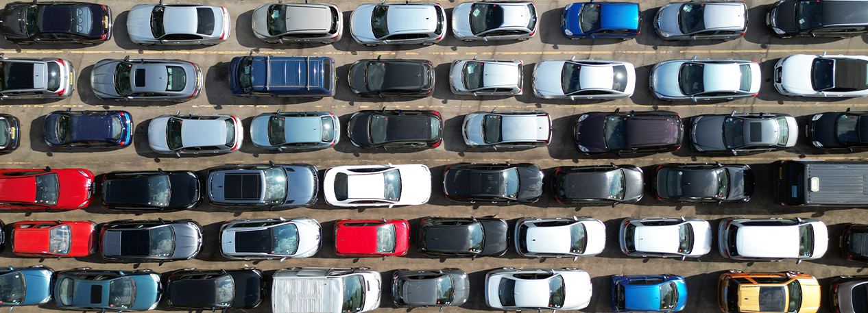 Aerial view of tightly parked cars