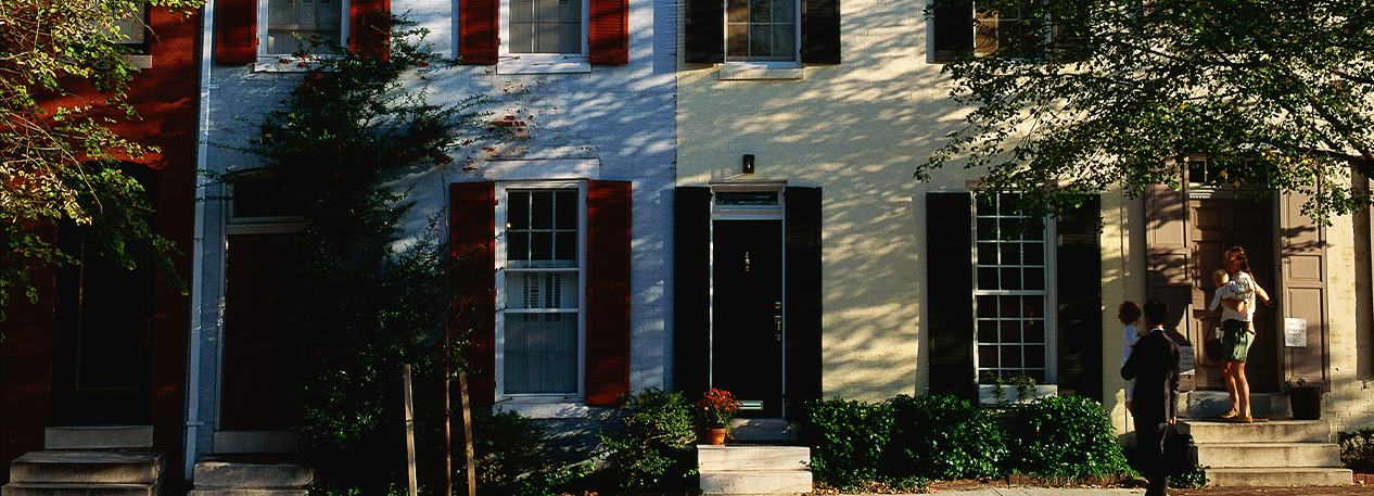 View of multiple rowhomes from the street