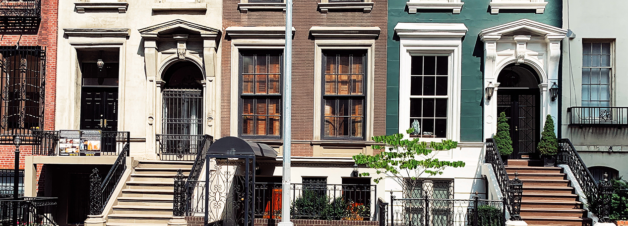Two neighboring brownstones.