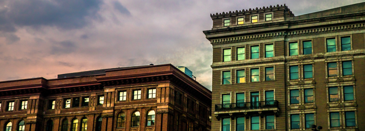 Top floors of city building from outside
