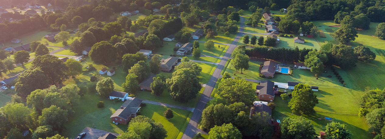 A scenic rural landscape dotted with homes.