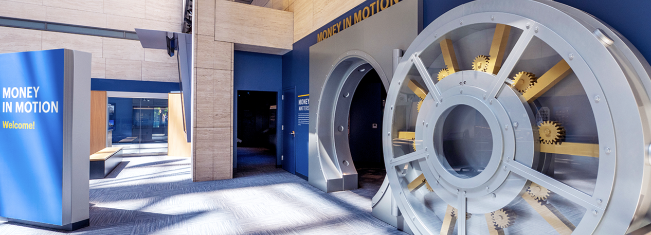 Side shot of vault door in Money in Motion