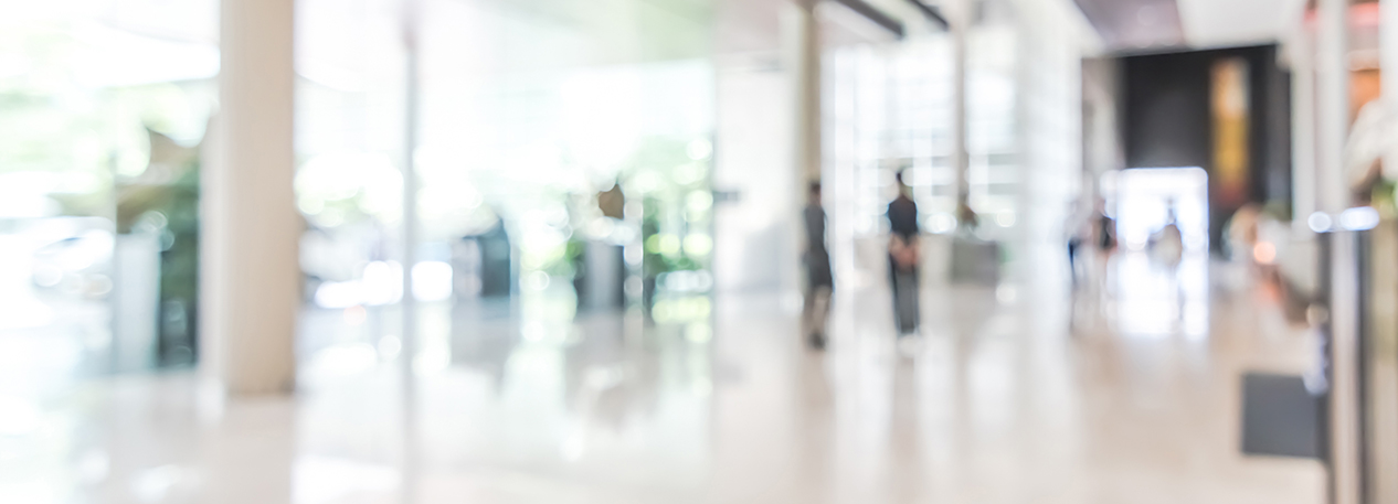 A slightly out-of-focus image of a bank lobby.
