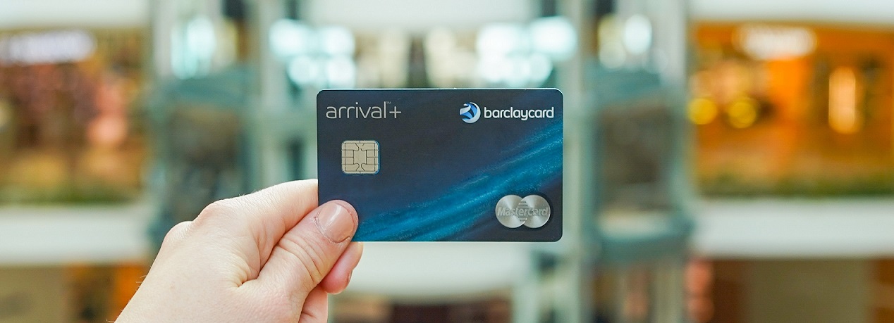Close up of someone holding a credit card in their hand