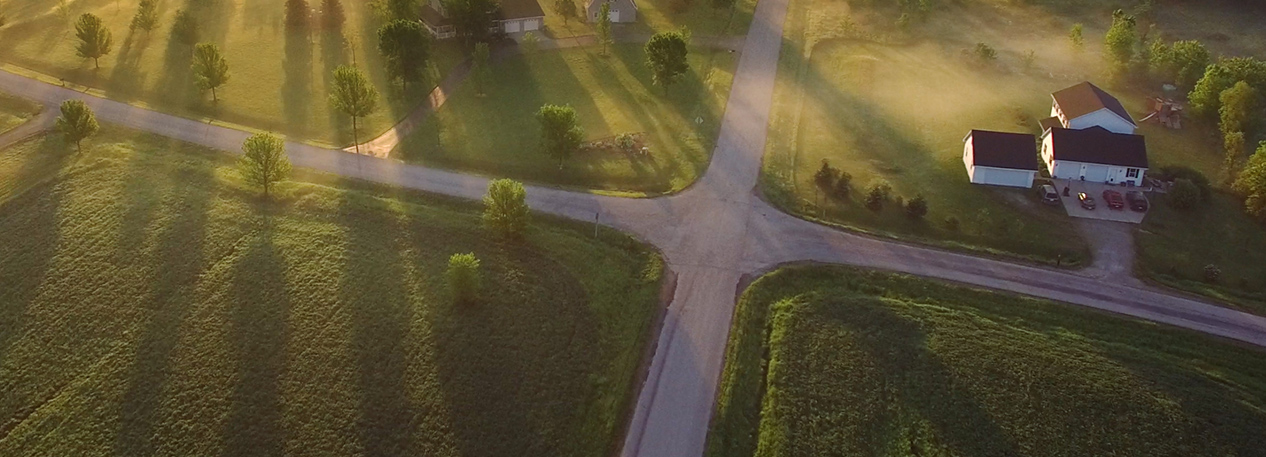 Aerial photo of a rural landscape with homes and farmland