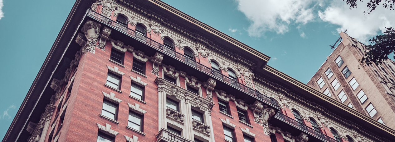 Upper floors of an ornate urban apartment building