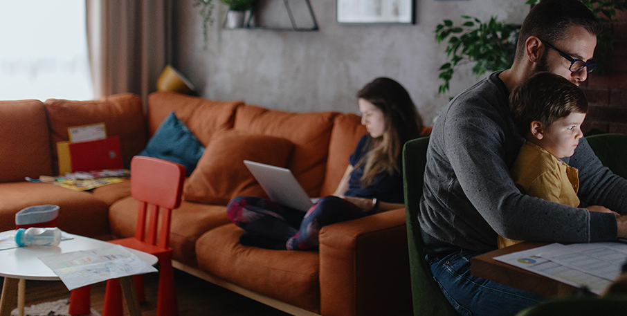 A family working from home in their living room