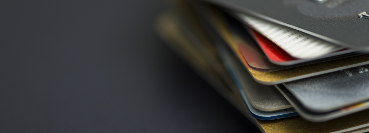 A stack of a variety of different credit cards