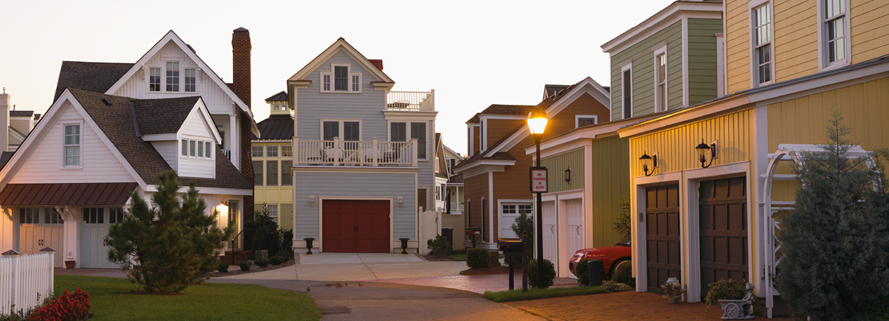 Homes in development with garages facing a common driveway