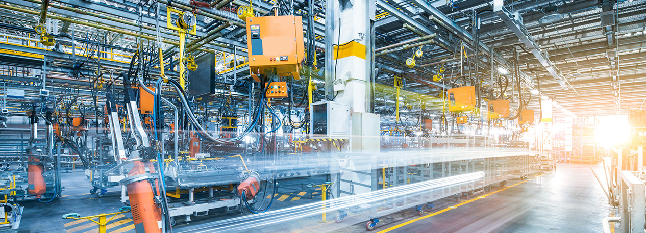 Large amounts of machinery on a factory floor