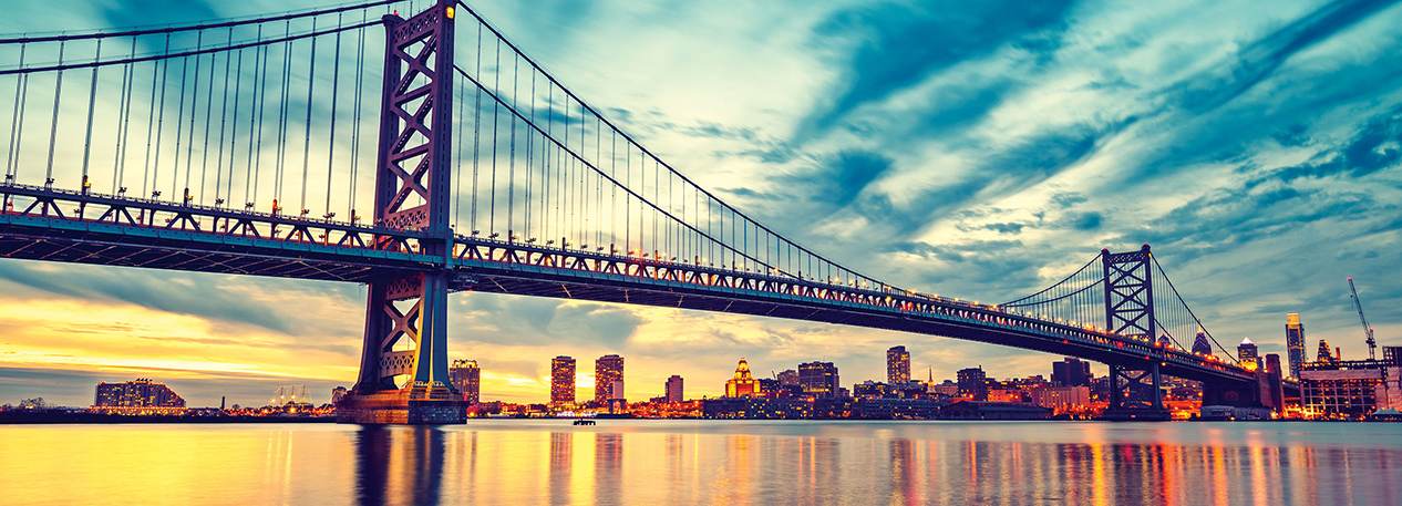 Panoramic view of the Ben Franklin Bridge at sunset