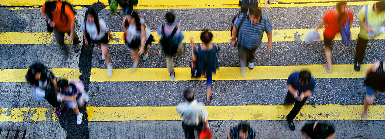 View from above of a group of pedestrians in a crosswalk