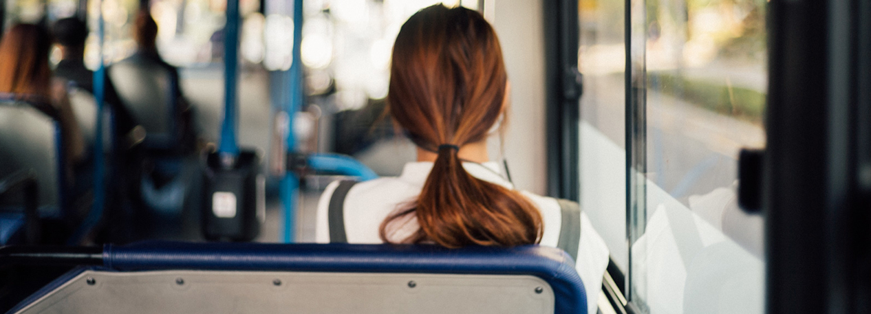 Woman sitting on a bus