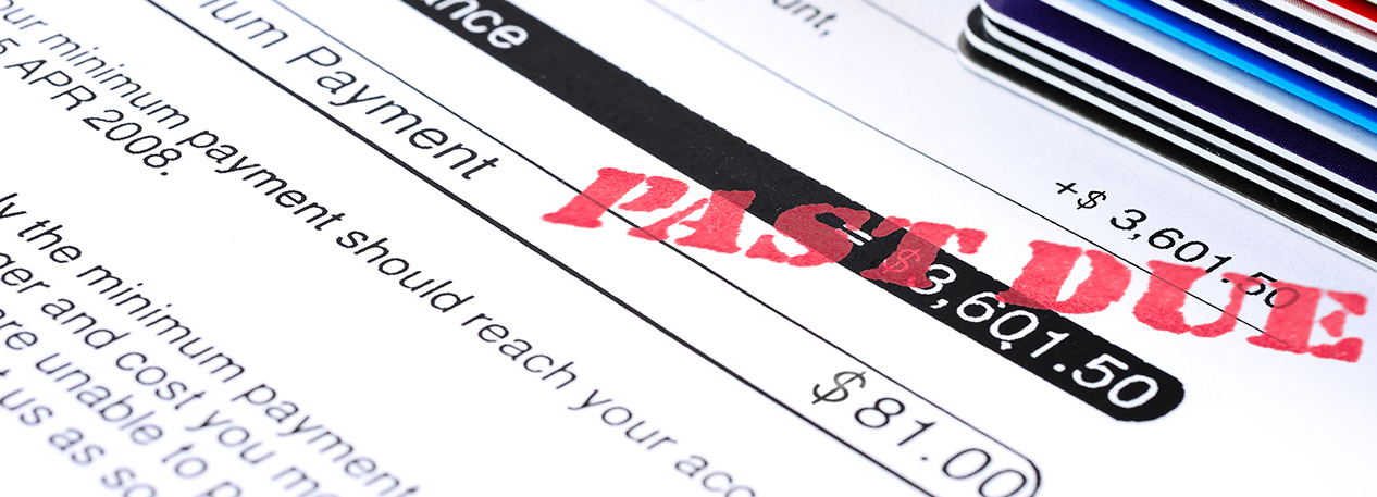 A credit card bill is stamped in red with "Past Due." 