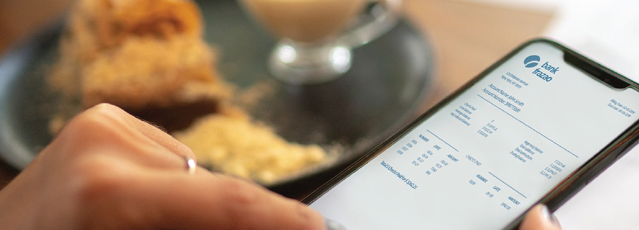 Closeup of a person using a cell phone for online banking