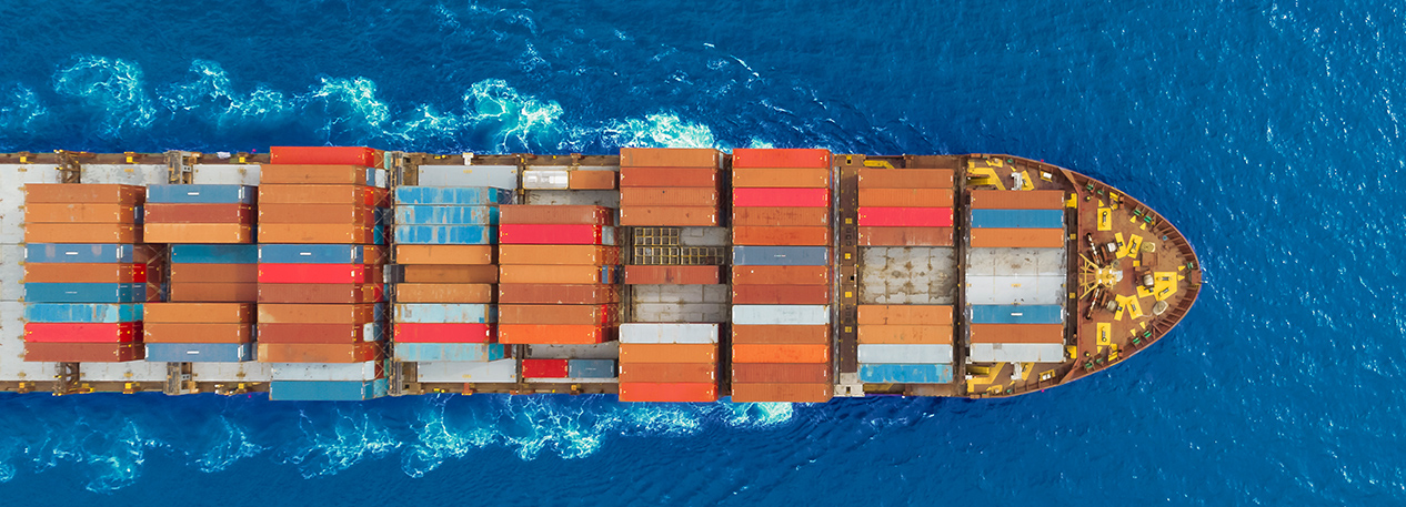 Aerial view of a cargo ship sailing in open water
