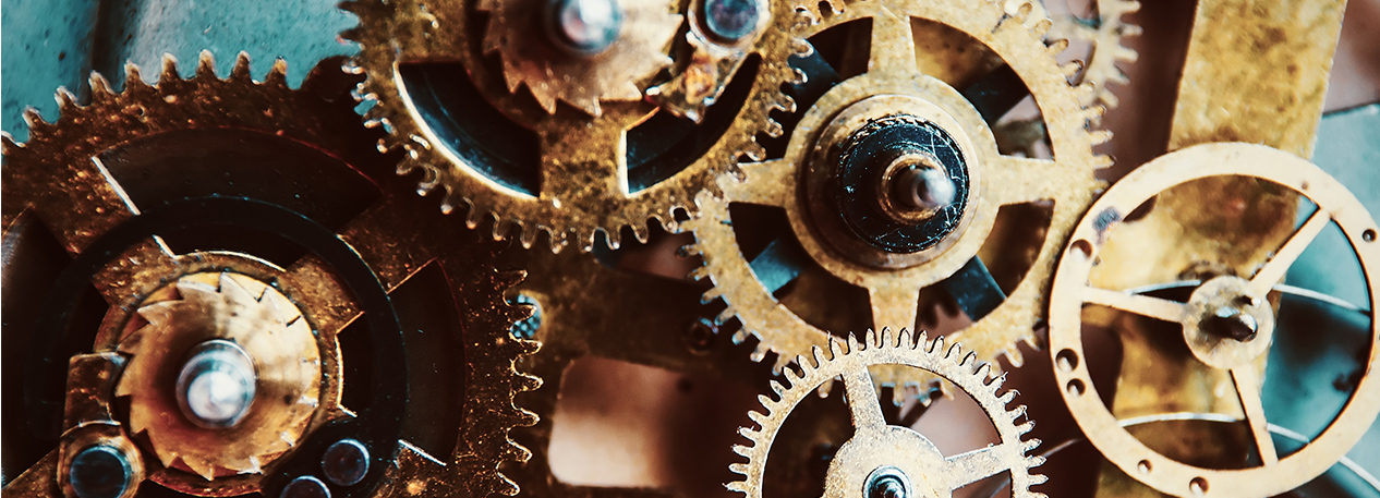 Mechanical gears working in unison.