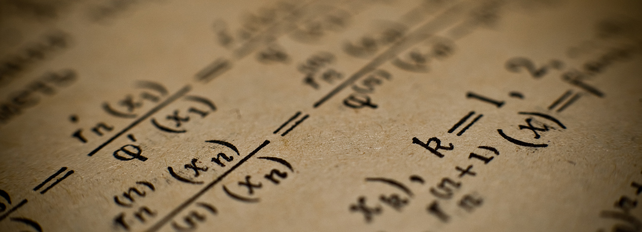 A close up image of a mathematical formula.