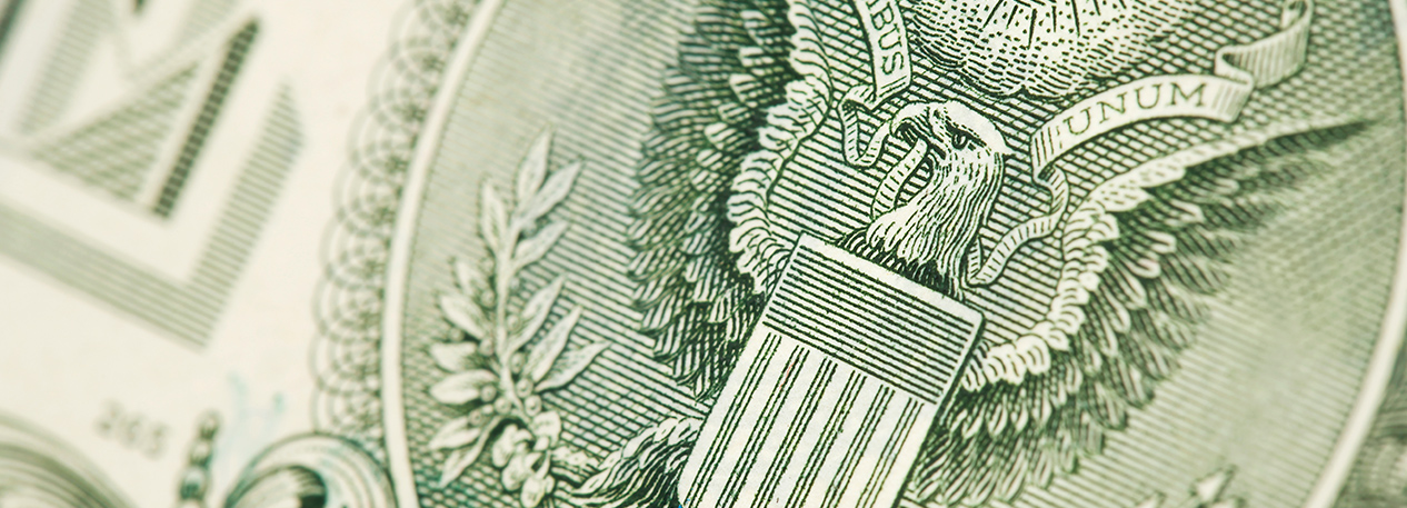 Close-up of the Great Seal of the United States on a dollar bill