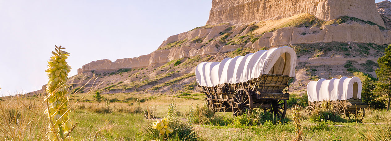 Covered wagon on a Western prairie