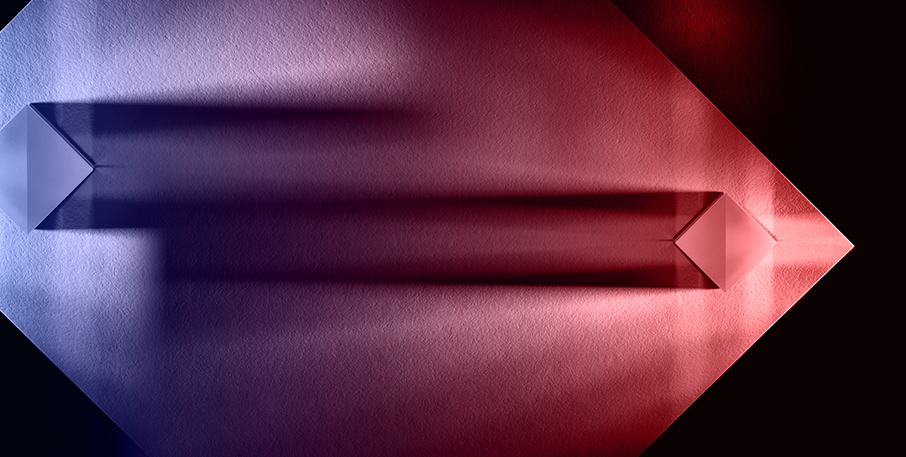 An abstract spectrum of blue and red colors.