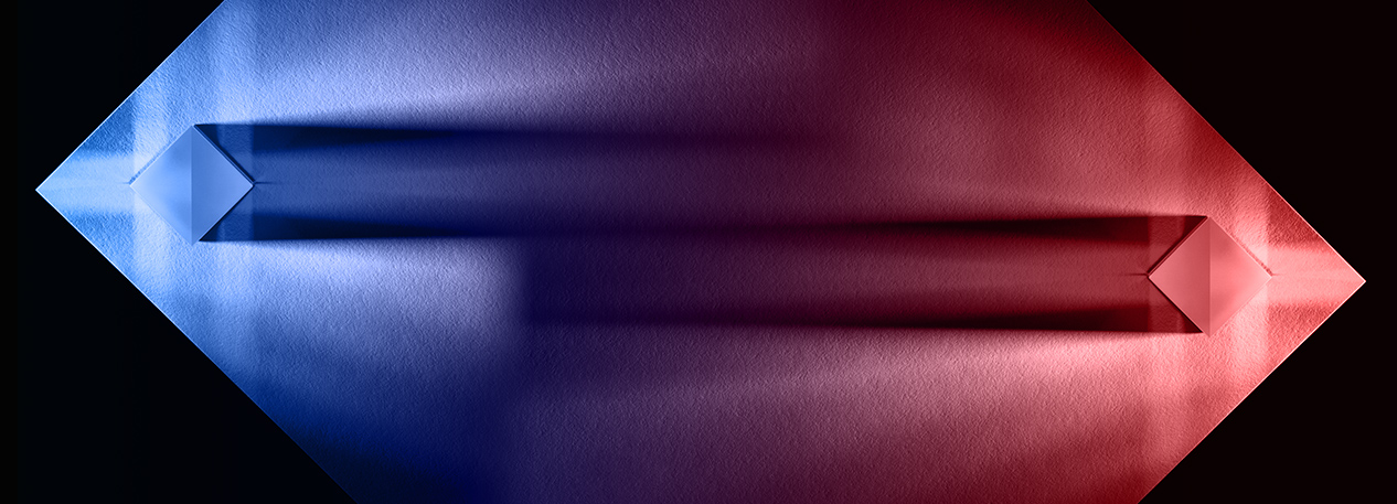 An abstract spectrum of blue and red colors.