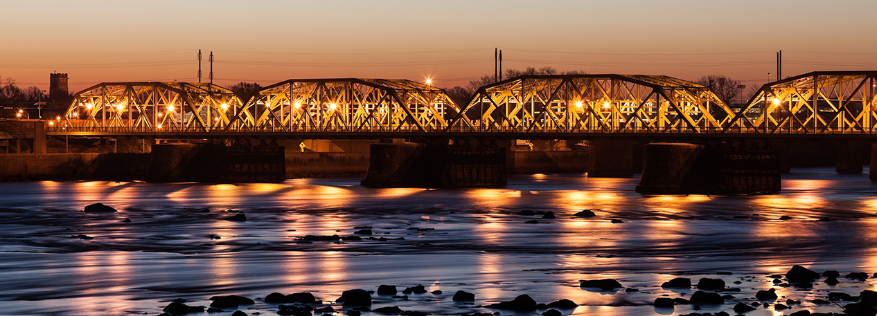 Evening view of a bridge across the Delaware River in Trenton, New Jersey.