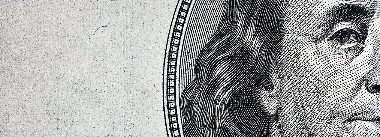 Close-up of Benjamin Franklin's portrait on the hundred-dollar bill