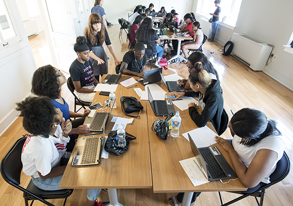  High school students work on their digital work portfolios at Drexel University's Dornsife Center for Neighborhood Partnerships.