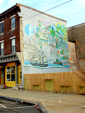 An "interactive fence" was an early action project to strengthen the commercial corridor on Girard Avenue in Philadelphia's Fishtown neighborhood.